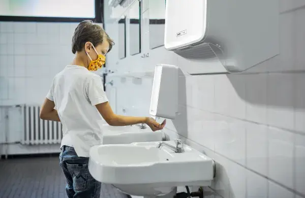 PureLine child using dispenser